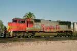 Santa Fe SD75M #227 is trailing unit on an eastbound manifest passing the depot